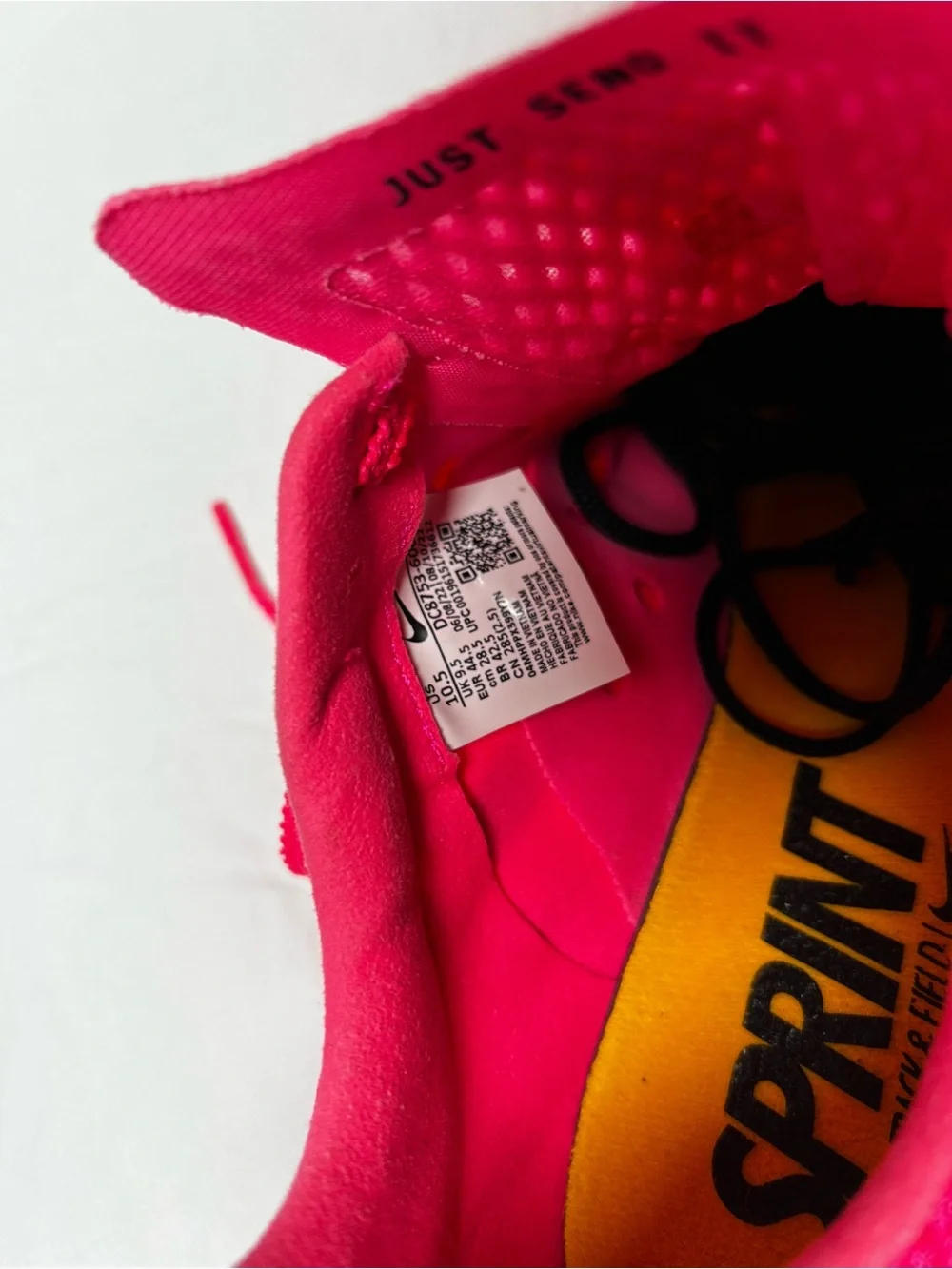 Nike Bright Pink Athletic track with Black Swoosh men’s 10/1/2